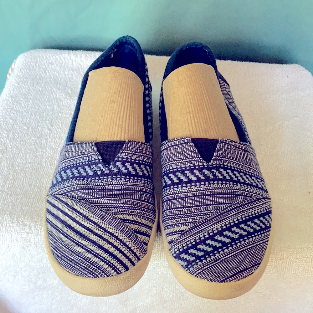 Tom’s blue/white espadrilles/slip ons